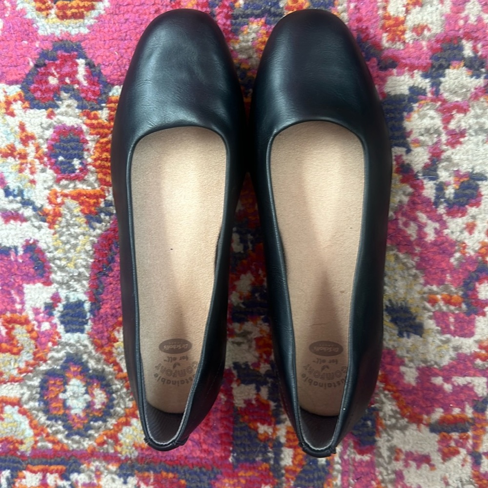 Dr. Scholl's black flats.